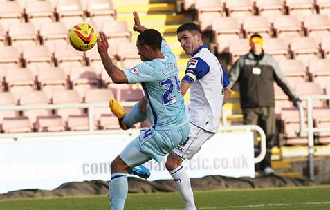 Ryan Lowe lobs Joe Murphy from 35 yards to complete his hat-trick for Tranmere. (Image: tranmererovers.co.uk)